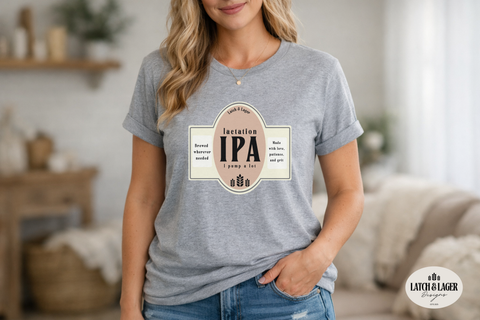 Woman wearing a gray t-shirt with a beer label design in a casual setting