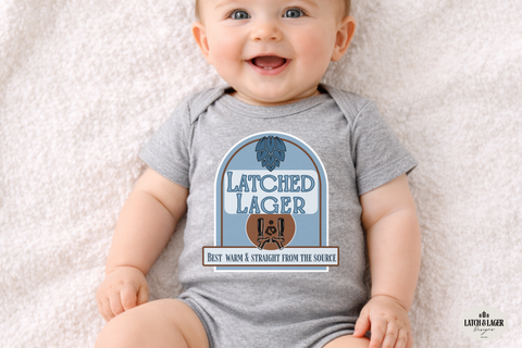 Baby wearing a gray onesie with 'Latched Lager' design on a light background