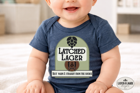 Baby wearing a blue onesie with 'Latched Lager' design
