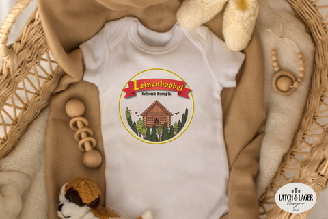 White baby onesie with a logo on a textured surface