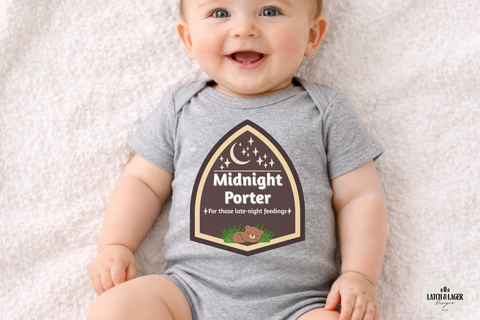 Baby wearing a gray onesie with 'Midnight Porter' design on a light background
