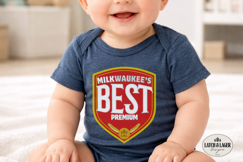 Baby wearing a blue onesie with 'Milkwaukee's Best' logo