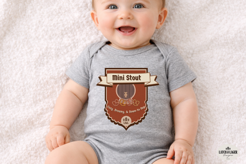 Baby wearing a gray onesie with a 'Mini Stout' design on a light background