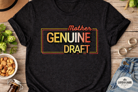 Black t-shirt with 'Mother Genuine Draft' text on a wooden surface with snacks and a hat.