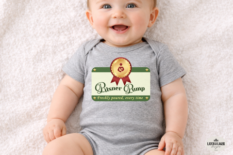 Baby wearing a gray onesie with a printed design on a light background