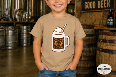Child wearing a t-shirt with a root beer design in a brewery setting
